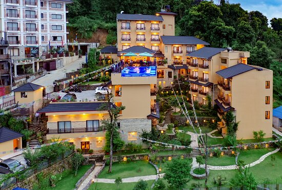 https://media-cdn.tripadvisor.com/media/photo-s/26/2b/ef/24/bar-peepal-resort.jpg